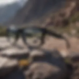 Stylish black glasses on a rocky terrain