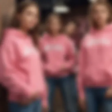 Group of young thrill-seekers sporting pink Hollister sweatshirts