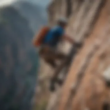 A breathtaking view of a climber on a rugged mountain cliff