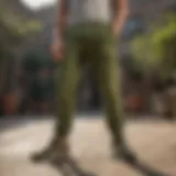 Stylish olive green joggers showcased in a dynamic outdoor setting
