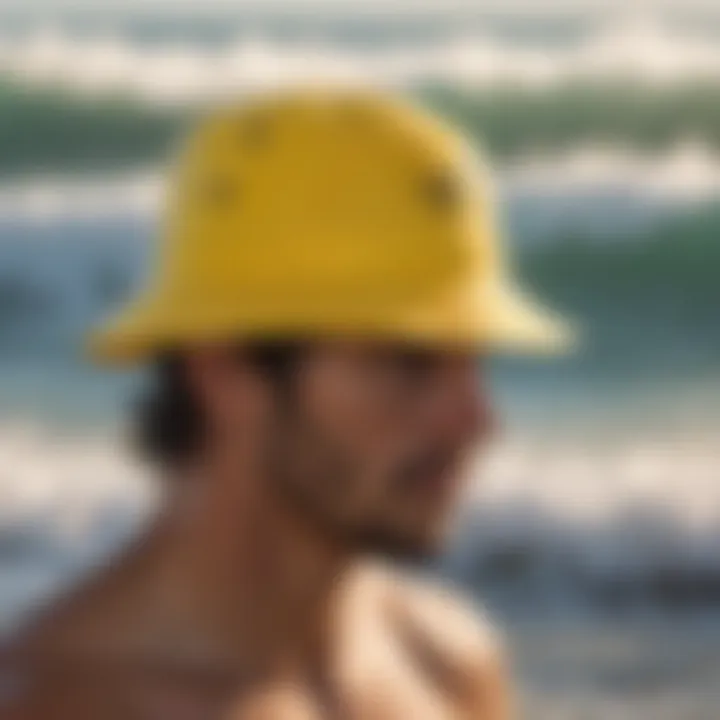 Close-up of a bright yellow bucket hat against the backdrop of a breathtaking surfing wave