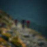 Riders navigating a rugged mountain trail