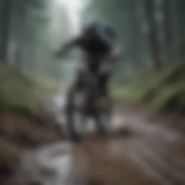 Mountain Biking in Wet Conditions Mountain biker riding on a muddy trail after rain