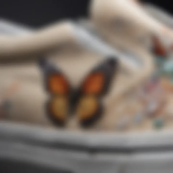 Close-up view of the unique butterfly design on Vans slip-ons