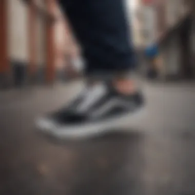 Vans White & Black UA Old Skool shoes in an urban setting