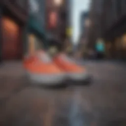 A stylish pair of Vans shoes on a vibrant urban background.