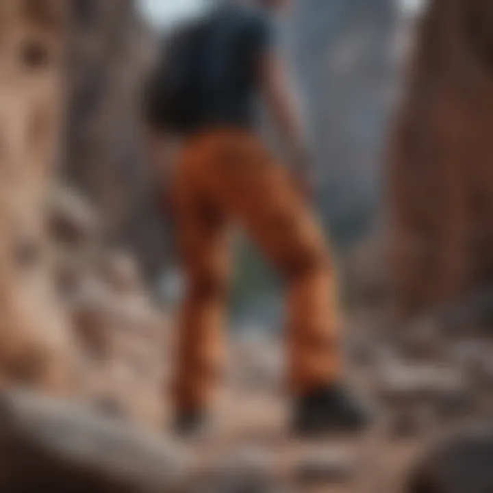 Active individual wearing Y&R cargo pants during rock climbing